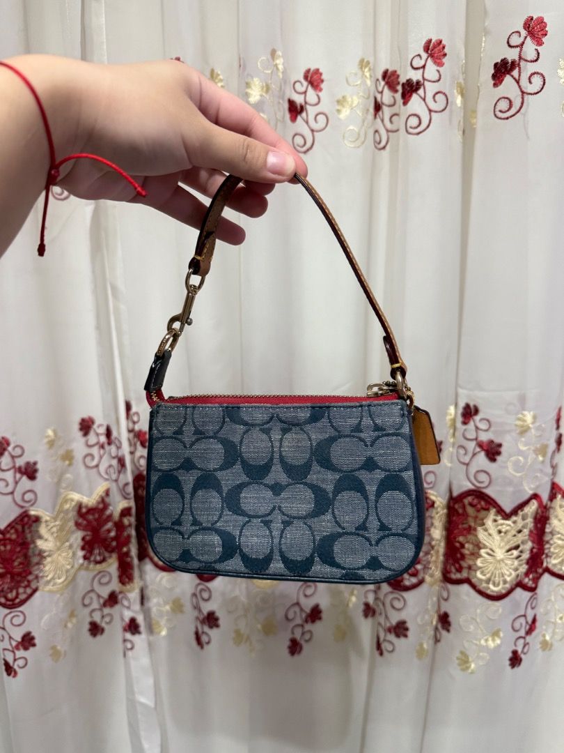 Coach Denim Nolita 15 (Category: Purses & Pouches) located in Cabuyao City. Submitted by safe.rachesells (Listing ID 1401420449, Image 2). Description: ☁️ super nice condition ☁️ used a few times ☁️ super cute!!! ☁️ lalamove shipping RFS: decluttering .