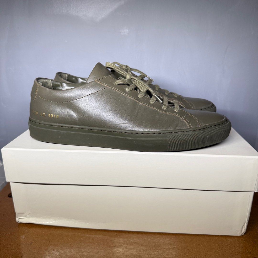Common Projects Original Achilles Low Olive (Category: Sneakers) located in Makati City. Submitted by johnf02 (Listing ID 1401477277, Image 2). Description: Common Projects Achilles Low Olive • Size: EU 42 • Price: Php 9,990 • RFS: Wrong size • Buy 2 items from my listings, get a discount • Sold on an as is, where is basis • Payment via GCash/Maya/BPI/BDO/Unionbank • Shipping to be shouldered by the buyer .