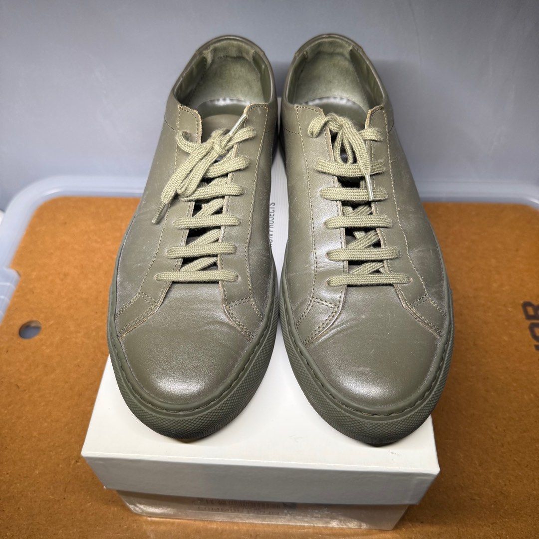 Common Projects Original Achilles Low Olive (Category: Sneakers) located in Makati City. Submitted by johnf02 (Listing ID 1401477277, Image 3). Description: Common Projects Achilles Low Olive • Size: EU 42 • Price: Php 9,990 • RFS: Wrong size • Buy 2 items from my listings, get a discount • Sold on an as is, where is basis • Payment via GCash/Maya/BPI/BDO/Unionbank • Shipping to be shouldered by the buyer .