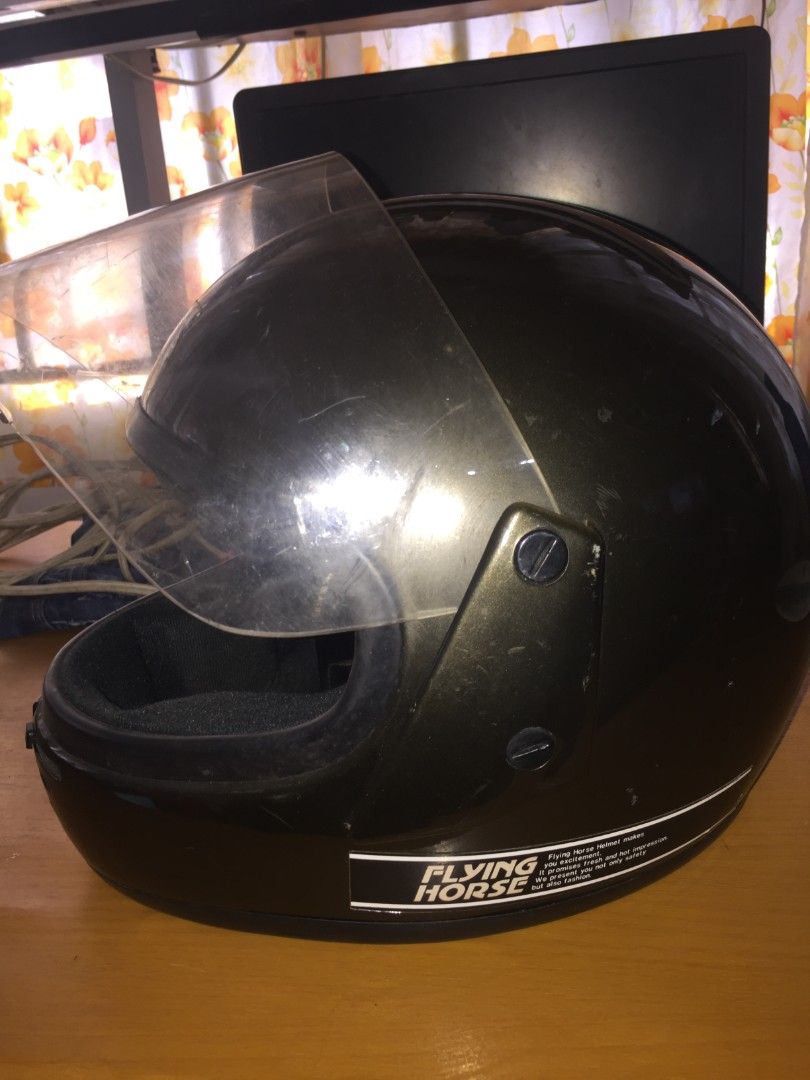 Flying Horse Motorcycle Helmet (Category: Helmets and other Riding Gears) located in Naga. Submitted by bonethugz1822 (Listing ID 1401529722, Image 3). Description: - Flying Horse motorcycle helmet - Glossy black exterior - Clear visor - Black interior - Secure chin strap - Good interior padding condition - Vents for airflow -Large .