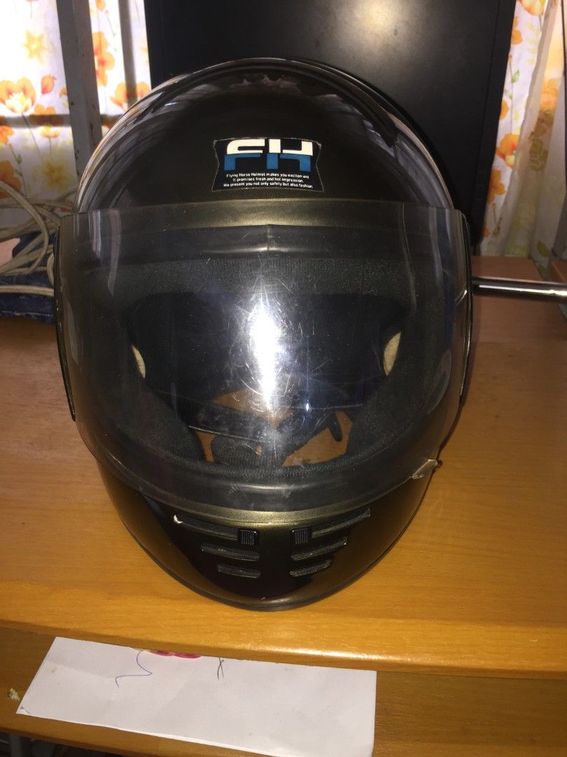 Flying Horse Motorcycle Helmet (Category: Helmets and other Riding Gears) located in Naga. Submitted by bonethugz1822 (Listing ID 1401529722, Image 1). Description: - Flying Horse motorcycle helmet - Glossy black exterior - Clear visor - Black interior - Secure chin strap - Good interior padding condition - Vents for airflow -Large .