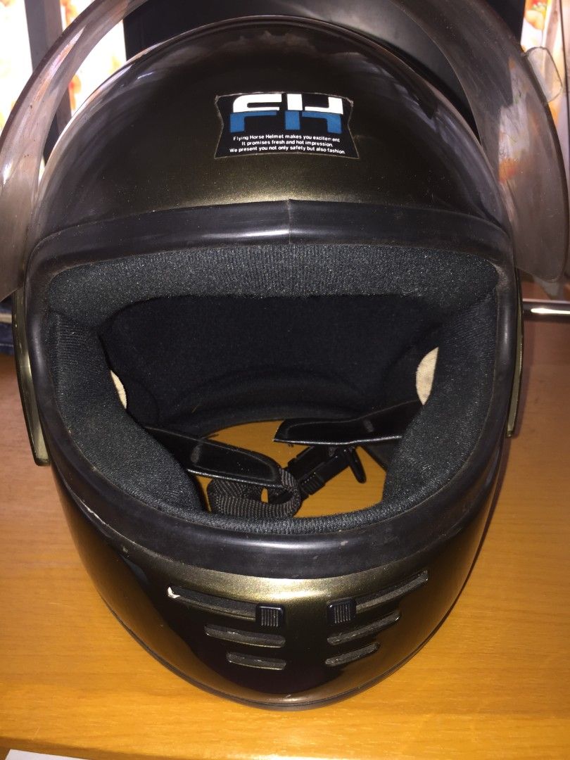 Flying Horse Motorcycle Helmet (Category: Helmets and other Riding Gears) located in Naga. Submitted by bonethugz1822 (Listing ID 1401529722, Image 2). Description: - Flying Horse motorcycle helmet - Glossy black exterior - Clear visor - Black interior - Secure chin strap - Good interior padding condition - Vents for airflow -Large .