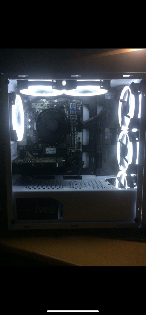 Gaming PC set (Category: Desktops) located in Manila. Submitted by russeltlsts (Listing ID 1401384875, Image 2). Description: Cpu: Ryzen 3 3100 4c8t 65w am4 Mobo: Asrock a320m-hdv r4.0 Gpu: Biostar rx550 4gb gddr5 Psu: Corsair CV450 80+ bronze Ram: Skihotar 2-8gb 2666mhz ddr4 Ssd: Transcend nvme m.2 256gb Hdd: Western digital 1tb Case: Rakk anyag white Kb: Rakk lam-ang lite mech kb Mouse: Rakk dasig mouse Monitor: Bezel 24” 75hz Cam: Inplay c7202