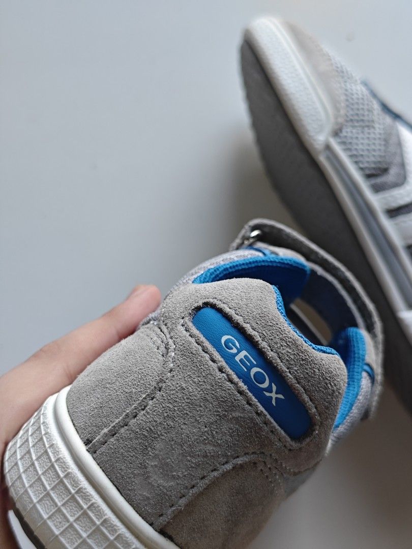 Geox Gray and Blue Sneakers (Category: Sneakers) located in Bulacan. Submitted by pjhen93 (Listing ID 1401431991, Image 2). Description: - Geox sneakers in gray and blue - Size 31 - Easy hook-and-loop strap - Breathable sole design - Mesh and suede upper - Geox logo on side and strap.
