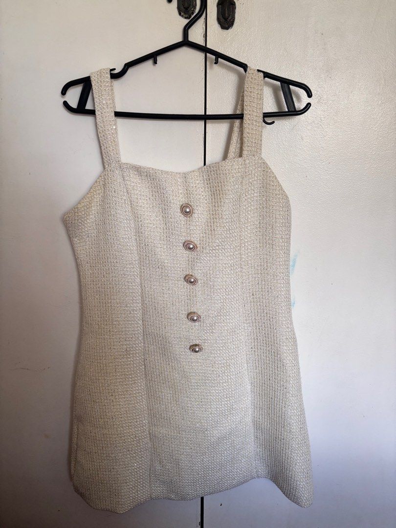 HJNN Tweed Dress Set (Category: Dresses) located in Apalit. Submitted by trinaaa25 (Listing ID 1401398038, Image 2). Description: - Tweed dress set - Mini dress with button details and square neckline - Thick straps - Matching cropped blazer - Classic collar - Two front pockets - Perfect for a chic and sophisticated look.