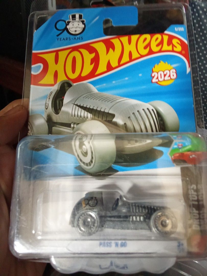 Hot Wheels Pass 'N Go 2026 (Category: Vehicle & Diecast Models) located in Quezon City. Submitted by batangisip (Listing ID 1401382517, Image 1). Description: - Hot Wheels Pass 'N Go diecast car - From the 90 Years Monopoly series - Dated 2026 - Silver color - Comes in original packaging - Packaging includes Hot Wheels and Monopoly logos.