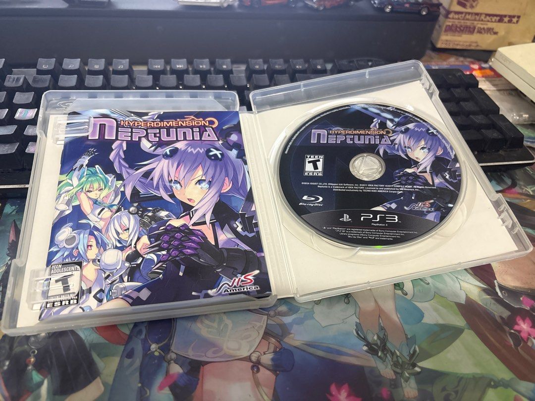 Hyperdimension Neptunia PS3 Game (Category: PlayStation) located in Manila. Submitted by avaritiahobbyshop (Listing ID 1401518270, Image 2). Description: - Hyperdimension Neptunia game for PlayStation 3 - Includes game disc and case - Case features anime artwork - Rated T (Teen) by ESRB - Published by NIS America - Blu-ray disc Buyer pays ship fee. Item is kind of old manage your expectations .