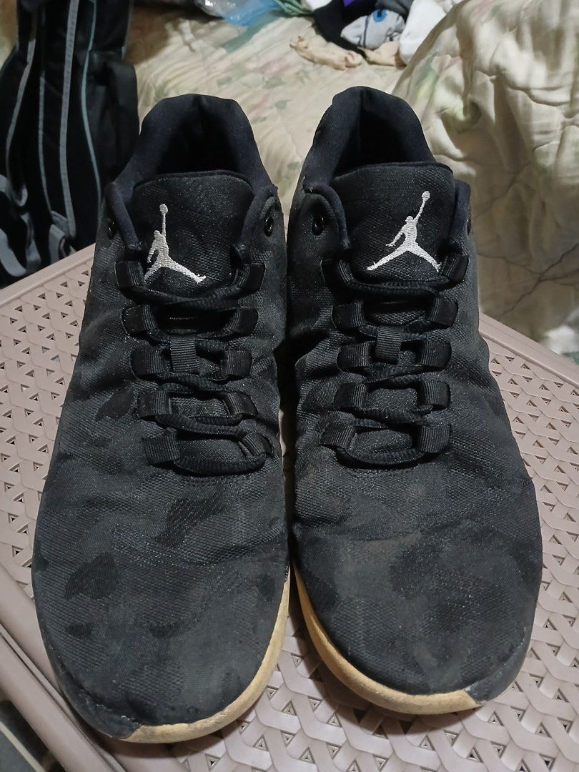 Jordan 9.5 US Black Camo Sneakers (Category: Sneakers) located in Guiguinto. Submitted by riesefeld (Listing ID 1401474733, Image 1). Description: - Black Jordan sneakers - Camo pattern - US Size: 9.5 - UK Size: 8.5 - EUR Size: 43 - 27.5 cm - Made in Vietnam - Black upper, white sole - With laces.