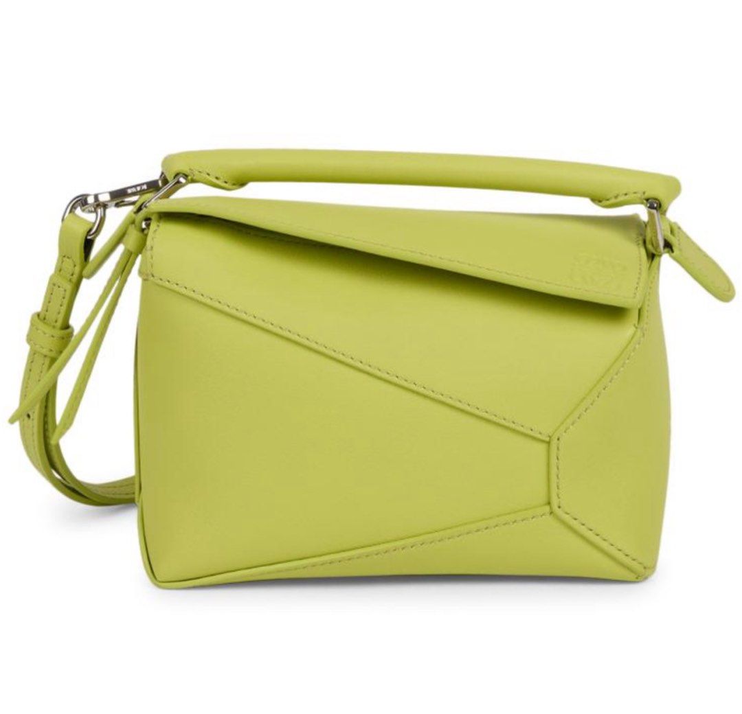 Loewe Puzzle Mini Bag - Lime Green (Category: Luxury Bags & Wallets) located in Minalin. Submitted by misissitri (Listing ID 1401483233, Image 1). Description: - Loewe Puzzle Mini Bag - Rank A, self authentication required - Coded, Sourced in Japan - SRP 145k in Ph - Vibrant lime green color - Mini size, ideal for daily use - Features a top handle and detachable shoulder strap - Unique geometric design - Secure zip closure - Fabric lined interior