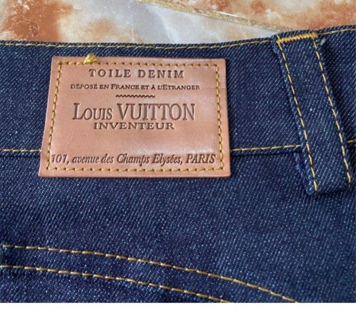 💯Authentic Louis Vuitton Denim Skirt (Category: Luxury Apparel) located in Tagum. Submitted by maryjanepradalux (Listing ID 1401495091, Image 3). Description: - Authentic Louis Vuitton denim skirt - Dark wash - Size 40 - Unique ruffled hem - Louis Vuitton logo on zipper and lining - Made in Italy - Embroidered with "Jane" on the front.