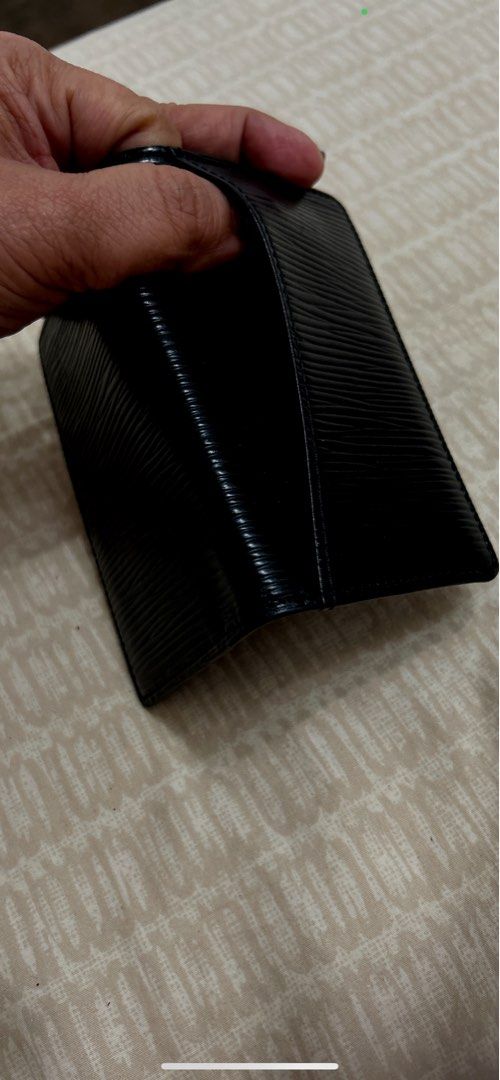LV epi leather wallet (Category: Luxury Bags & Wallets) located in Lapu Lapu. Submitted by vintagoo (Listing ID 1401486952, Image 3). Description: Authentic LV epi leather wallet/card holder. No scratches as seen on pic. But the inner linings are peeling off which usually happens in this kind of leather. Bought in Japan..