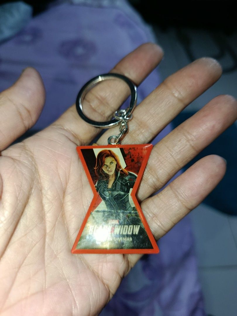 Marvel Black Widow Keychain etc. (Category: Western Merchandise) located in Quezon City. Submitted by kristal68 (Listing ID 1401525246, Image 3). Description: - Black Widow keychain - Features a silver key ring - Pendant design: Black Widow symbol (red and black) - Back of pendant: Marvel logo and production details - Great collectible for Marvel fans! take all for p60 free Xmas tree decor.