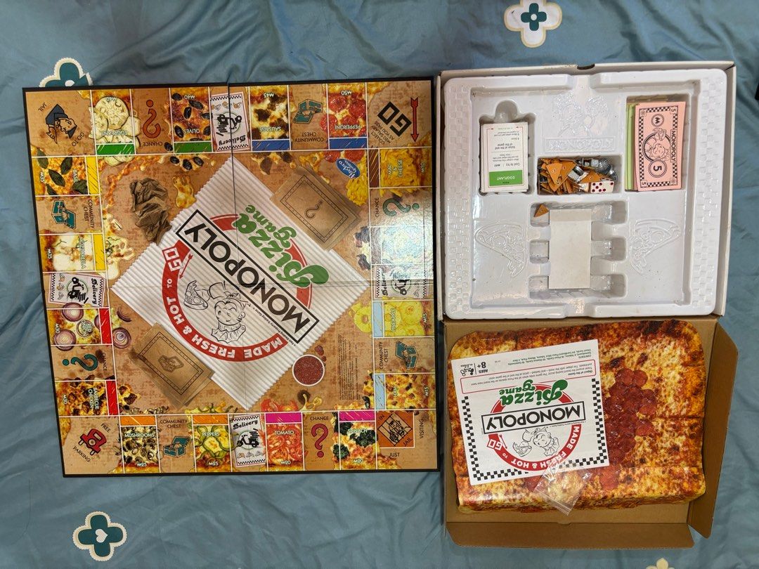 Monopoly Pizza (Category: Board Games & Puzzles) located in Antipolo. Submitted by qwerty2301 (Listing ID 1401442726, Image 2). Description: Hasbro Gaming Monopoly (Pizza Edition) Inclusion: - Board itself - Instruction Manual - Pizza Slices - Cards - Dice - Characters 📦 MOD: LBC, Lalamove, or Meet up (QC Area) 💵 MOP: Gcash, Bank Transfer (BPI), or Cash .