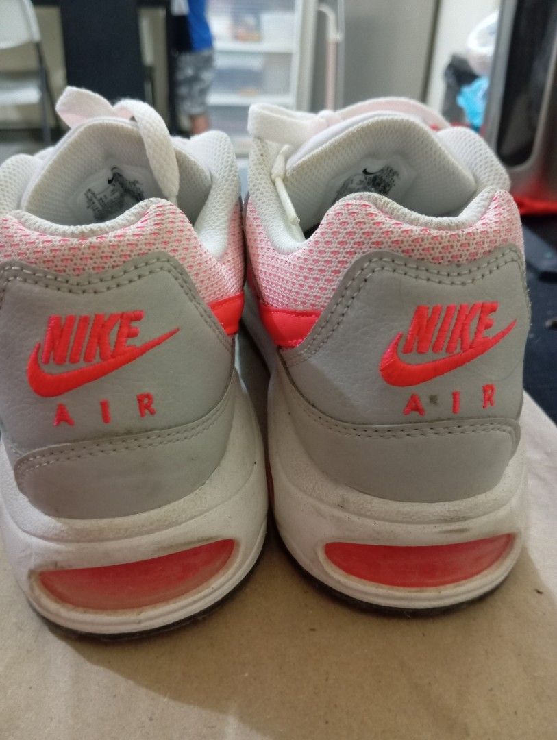 Nike Air Max Sneakers - White/Pink (Category: Sneakers) located in Quezon City. Submitted by AuthenticGoods4U (Listing ID 1401459952, Image 3). Description: - Nike Air Max sneakers - Color: White, grey, and pink - Size: US 7.5, EUR 38.5, CM 24.5 - Features Nike Air logo - Pink air bubble in heel - Used once.