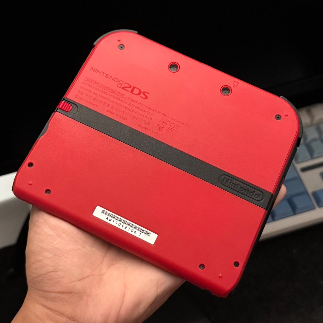 Nintendo 2DS Red 64GB (Category: Nintendo) located in Quezon City. Submitted by consoleciety (Listing ID 1401408773, Image 3). Description: Selling Red Nintendo 2DS 64GB for 7,500PHP —no performance issue, in great condition! —8.8/10 cosmetics —modded 64gb, random games installed & 150+ themes includes unit, usb cord, 64gb sd expect signs of use as unit is second hand. 1. meet-up at Mezza Residences Sta Mesa / FEU Manila 2. Nationwide COD/COP shi