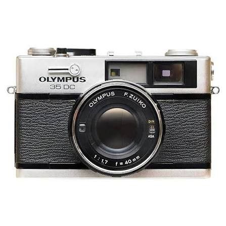 Olympus 35 DC Film Camera (Category: Cameras) located in Los Banos. Submitted by thriftparadiseph (Listing ID 1401360383, Image 1). Description: - Olympus 35 DC film camera - F.Zuiko 40mm lens - Includes lens cap and neck strap - Silver and black body - 1:1.7 aperture - Built-in light meter.