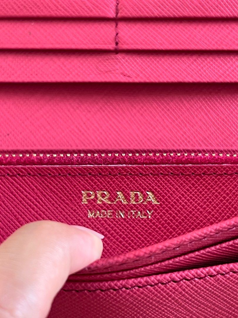 PRADA Wallet Saffiano Pink (Category: Luxury Bags & Wallets) located in Amadeo. Submitted by davenlord588444 (Listing ID 1401392476, Image 3). Description: Bought from KaiVintagePH 8.5/10 Issue: May pen mark po sa loob. Nabili ko napo ito may ganun na. Slightlt negotiable.