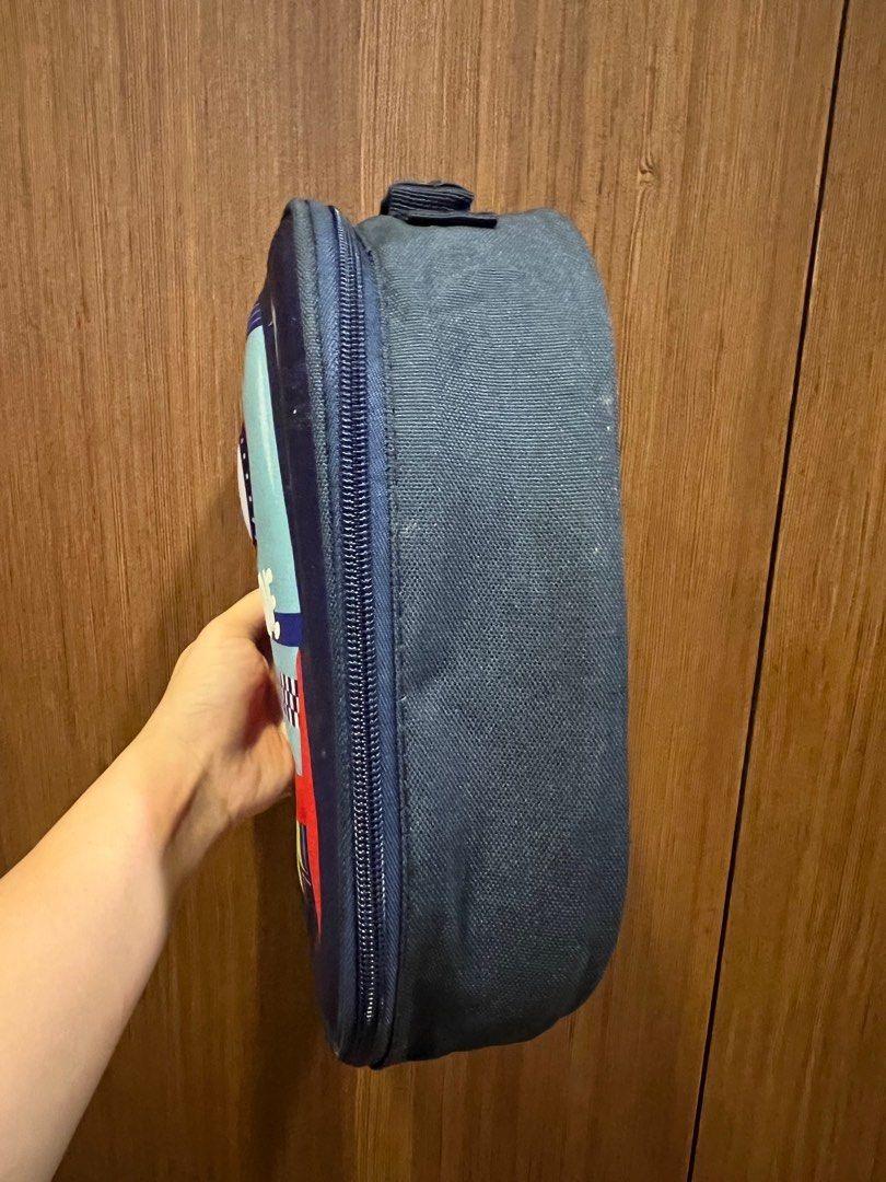 Rocket Ship insulated Lunch Bag with “Dwayne” printed (Category: Other Babies Going Out Needs) located in Quezon City. Submitted by liz.ty (Listing ID 1401420258, Image 2). Description: - Rocket ship design lunch bag - Navy blue exterior - Silver insulated interior - Zipper closure - Convenient handle - Keeps food and drinks cool - Name on bag: "Dwayne".