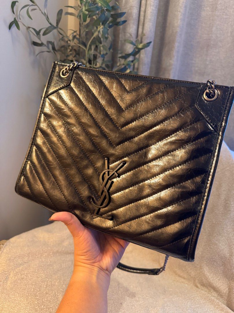 YSL Niki Shopping Tote bag (Category: Luxury Bags & Wallets) located in Rizal. Submitted by mamariamia (Listing ID 1401457775, Image 2). Description: Saint Laurent Niki bag. It is a designer handbag known for its crinkled vintage leather and the iconic YSL monogram.