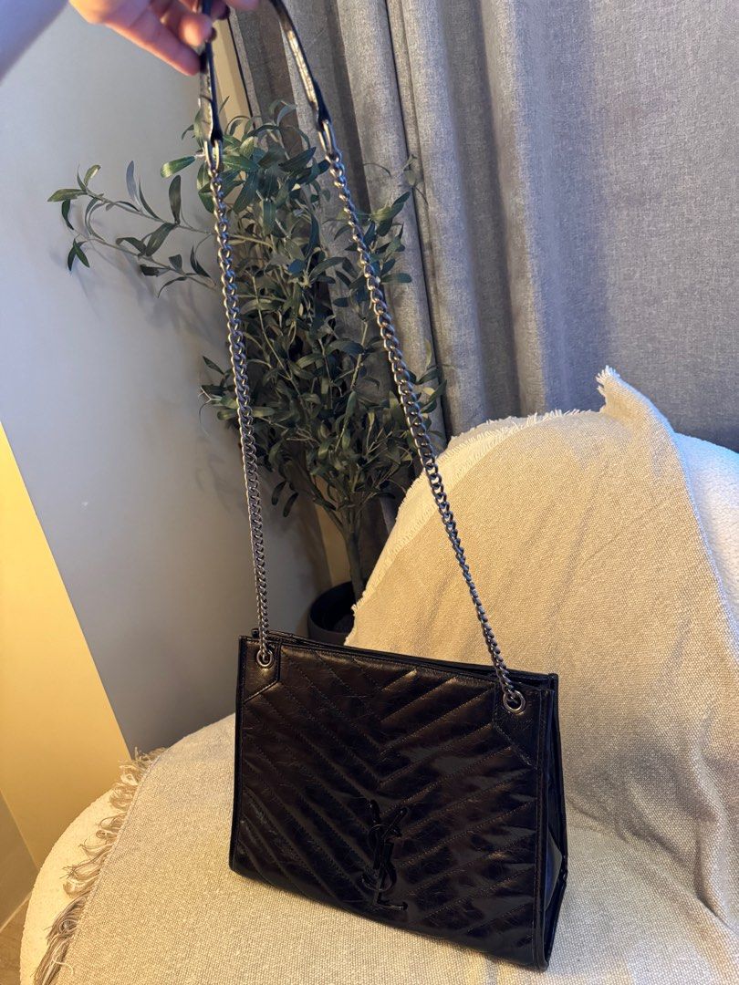YSL Niki Shopping Tote bag (Category: Luxury Bags & Wallets) located in Rizal. Submitted by mamariamia (Listing ID 1401457775, Image 3). Description: Saint Laurent Niki bag. It is a designer handbag known for its crinkled vintage leather and the iconic YSL monogram.