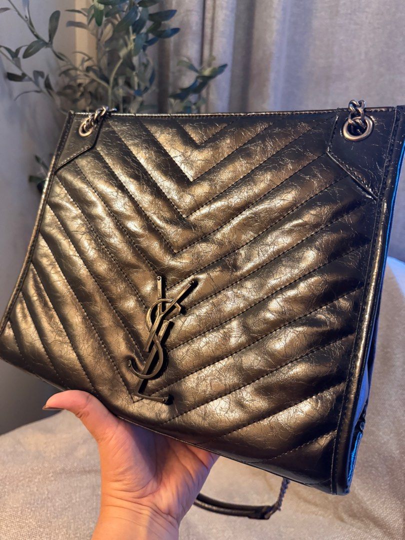 YSL Niki Shopping Tote bag (Category: Luxury Bags & Wallets) located in Rizal. Submitted by mamariamia (Listing ID 1401457775, Image 1). Description: Saint Laurent Niki bag. It is a designer handbag known for its crinkled vintage leather and the iconic YSL monogram.