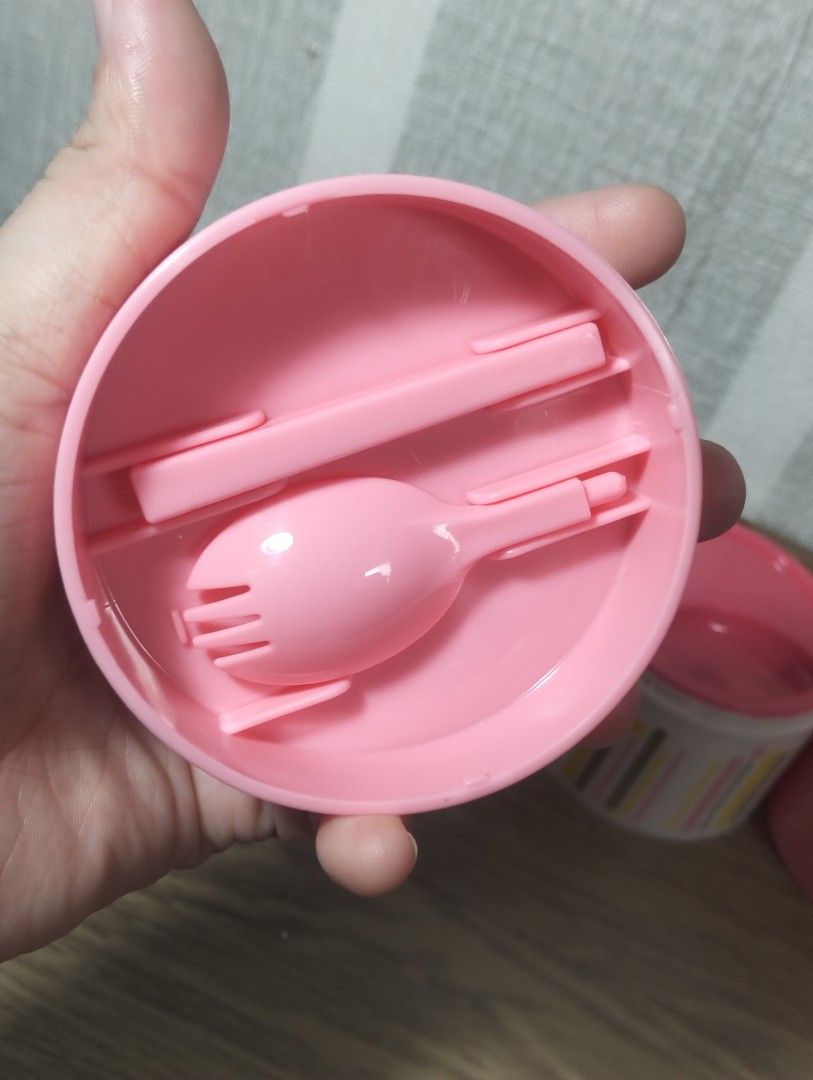 STACKABLE CHOKINGYO BENTO BOX/LUNCH CONTAINER (Category: Food Organization & Storage) located in Batangas. Submitted by amerie_store (Listing ID 1401408571, Image 3). Description: -Pink lunch box features three stackable containers, perfect for separating your food. It includes a lid with a handle for easy carrying. The set comes with a pink spoon and chopsticks, stored in a dedicated compartment. The containers have different designs, including 