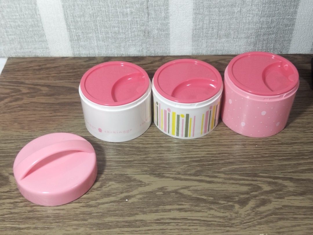 STACKABLE CHOKINGYO BENTO BOX/LUNCH CONTAINER (Category: Food Organization & Storage) located in Batangas. Submitted by amerie_store (Listing ID 1401408571, Image 2). Description: -Pink lunch box features three stackable containers, perfect for separating your food. It includes a lid with a handle for easy carrying. The set comes with a pink spoon and chopsticks, stored in a dedicated compartment. The containers have different designs, including 
