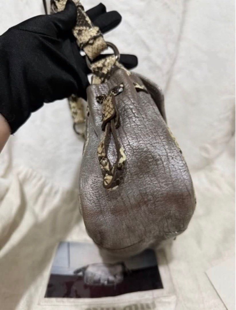 Authentic Miu Miu Back Python Handbag Shoulder Bag Leather Silver (Category: Luxury Bags & Wallets) located in Paranaque City. Submitted by authentic_mj (Listing ID 1396355798, Image 3). Description: Authentic Miu Miu Back Python Handbag Shoulder Bag Leather Silver Preloved Authentic from UAE With dustbag With cards.