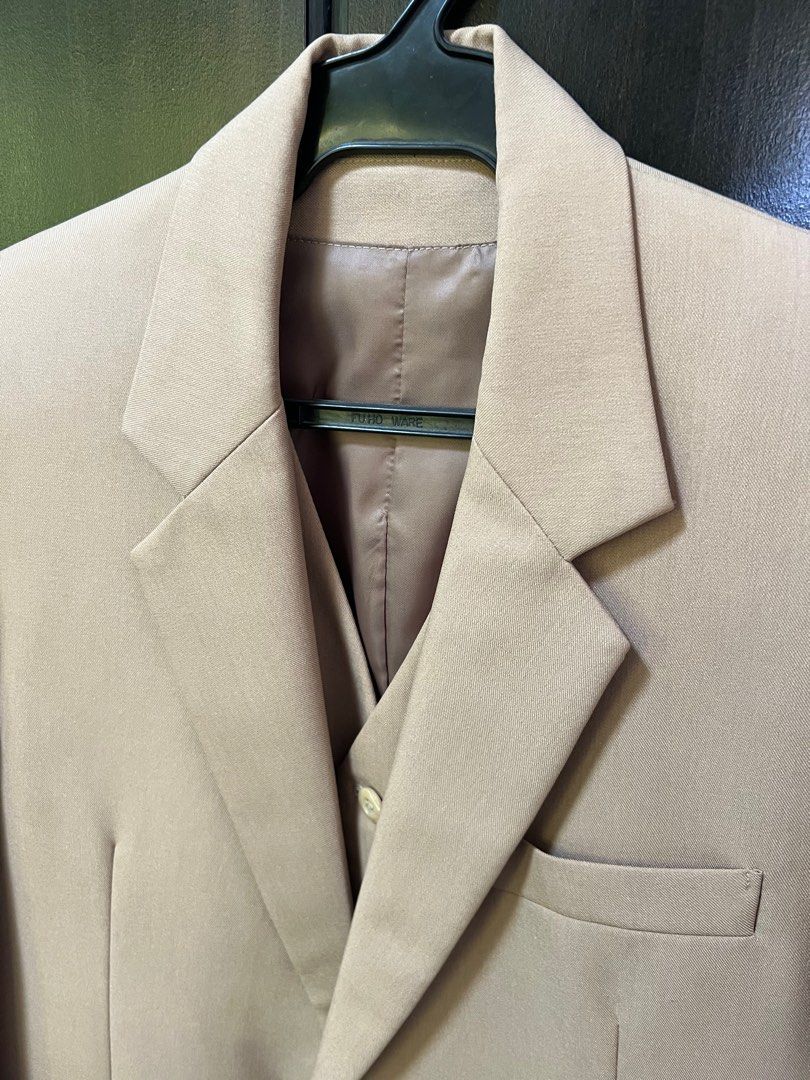 Beige coat or blazer with matching vest (Category: Coats, Jackets and Outerwear) located in Paranaque City. Submitted by decluttering1990 (Listing ID 1396315776, Image 3). Description: Beige coat with matching vest Php2000 for both Used three times; professionally dry cleaned after each use and stored with plastic cover Both with lining Custom made; not standard size Coat has 2 buttons and no vent, 2 inner pockets Vest has 5 buttons; no adjustmen