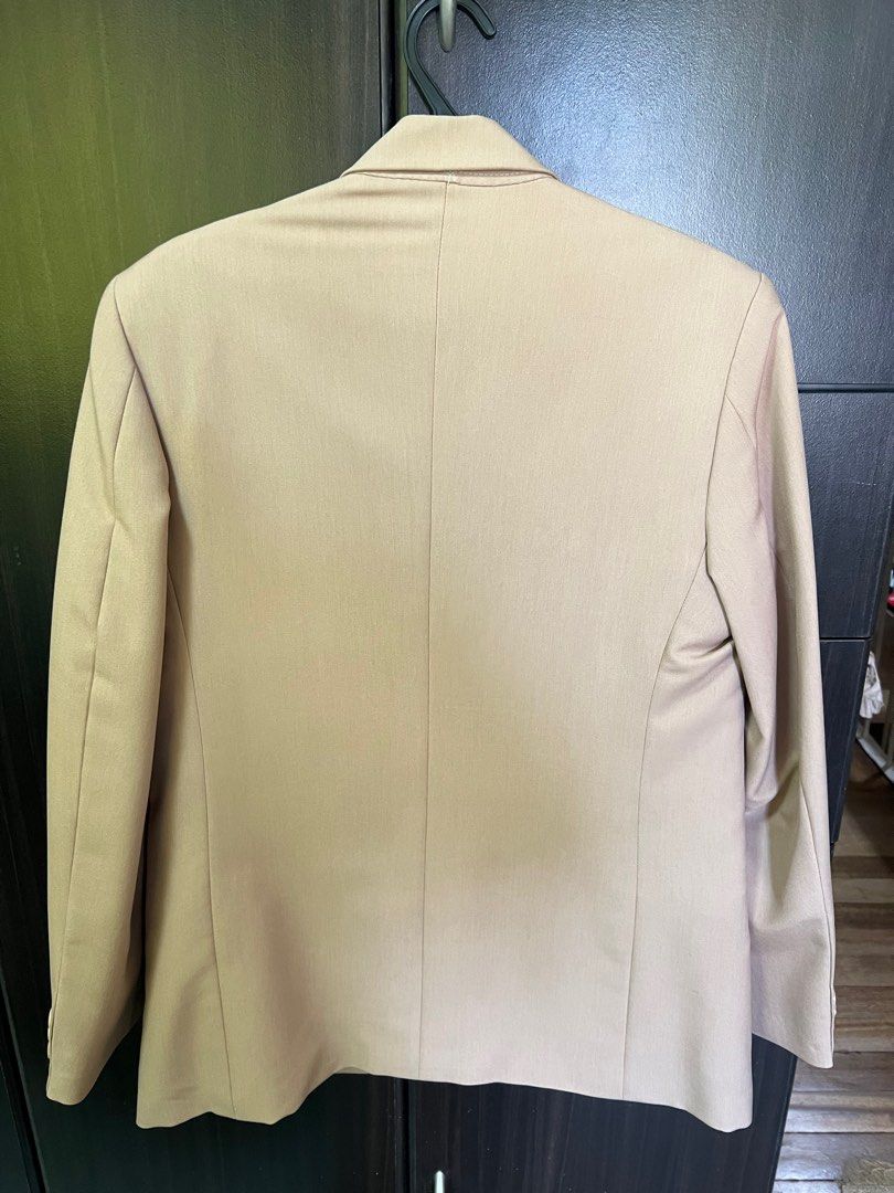 Beige coat or blazer with matching vest (Category: Coats, Jackets and Outerwear) located in Paranaque City. Submitted by decluttering1990 (Listing ID 1396315776, Image 2). Description: Beige coat with matching vest Php2000 for both Used three times; professionally dry cleaned after each use and stored with plastic cover Both with lining Custom made; not standard size Coat has 2 buttons and no vent, 2 inner pockets Vest has 5 buttons; no adjustmen