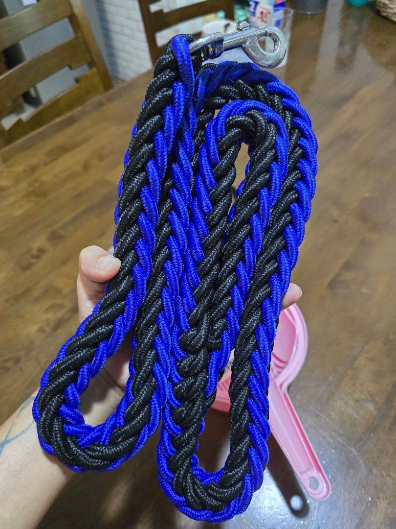 Braided Dog Leash - Blue and Black (Category: Homes & Other Pet Accessories) located in Cavite. Submitted by rlee18 (Listing ID 1396302806, Image 1). Description: - Durable braided dog leash - Color: Blue and Black - Sturdy metal clip - Comfortable grip - Perfect for daily walks and outdoor adventures.