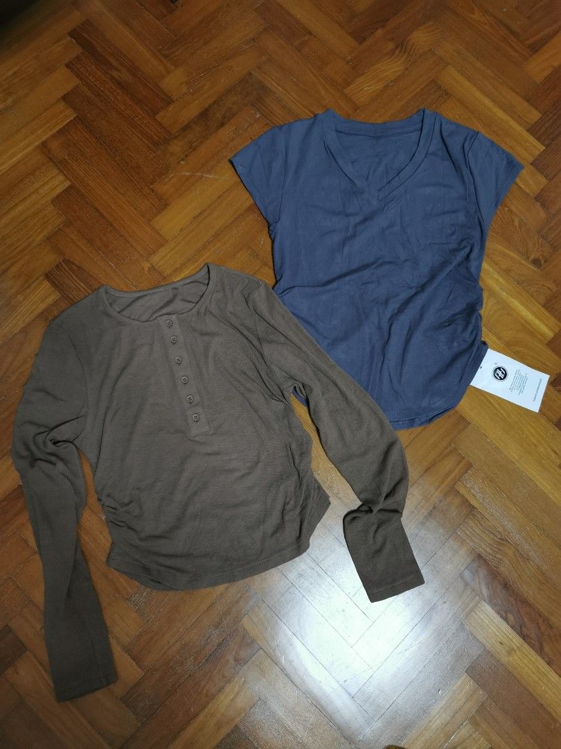 BrandNew Tops - tencel soft material T-shirts 2 pics bundle deal (Category: Blouses) located in Singapore. Submitted by foxandbear (Listing ID 1396447653, Image 1). Description: - Two brand new tops - Includes: - Brown long-sleeved top with buttons chest 80-110cm length45-50cm - Blue V-neck top chest 82-110cm. Length 45-55cm - Both tops feature ruched sides - Brand new with tags 28.