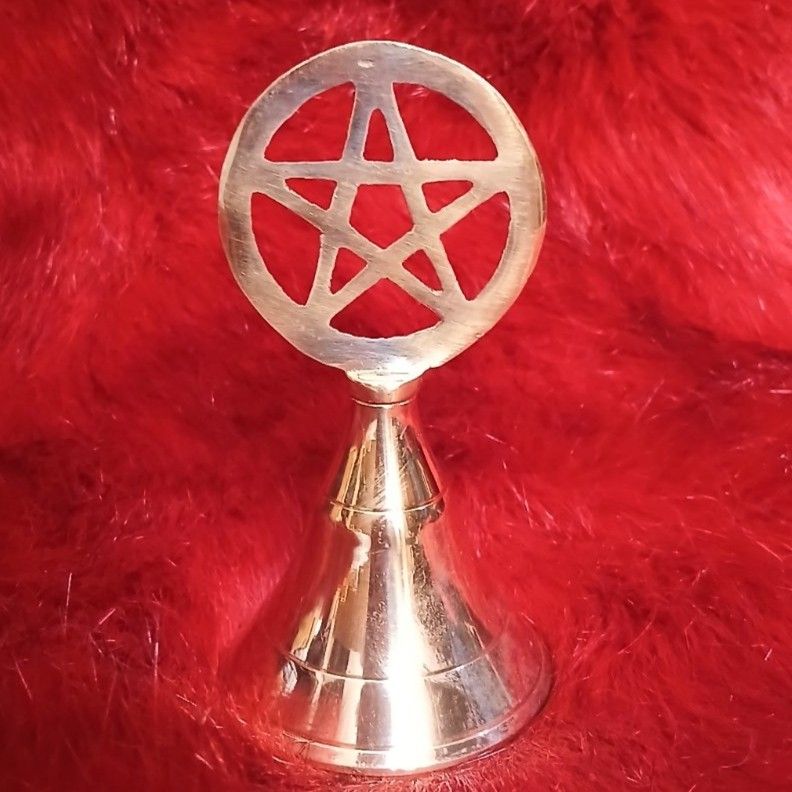 Brass Wiccan Altar Hand Bell 3" (Category: Religious Items) located in Cavite. Submitted by asianpretty (Listing ID 1396315303, Image 3). Description: Brass Hand bell 3" A clear toned brass bell with sleek, gentle curves and just the barest minimum of decoration near the lip. Brass. 3" x 1 1/2" A Wiccan altar bell is a ritual tool used to cleanse sacred space, invoke deities, and mark the beginning and end of ceremonies. The bell's clear, resonan