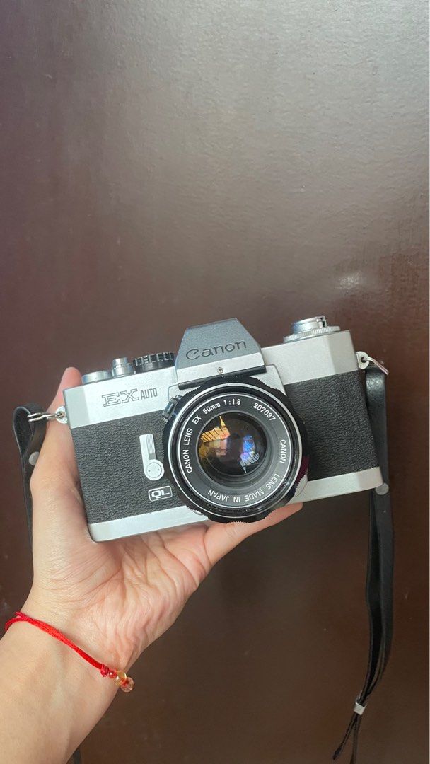 Canon Ex Auto (Film tested) (Category: Cameras) located in Quezon City. Submitted by kingbebop (Listing ID 1396328365, Image 1). Description: Notes: - Film tested and working - Can send sample shots upon request - Cosmetics 6.5/10 - Meter / EE feature untested - Lens got some small specks but generally okay Issues: - Has specks on its prism glass. Can be seen in viewfinder but doesn't affect the photos (could no longer be cleaned unless you repla