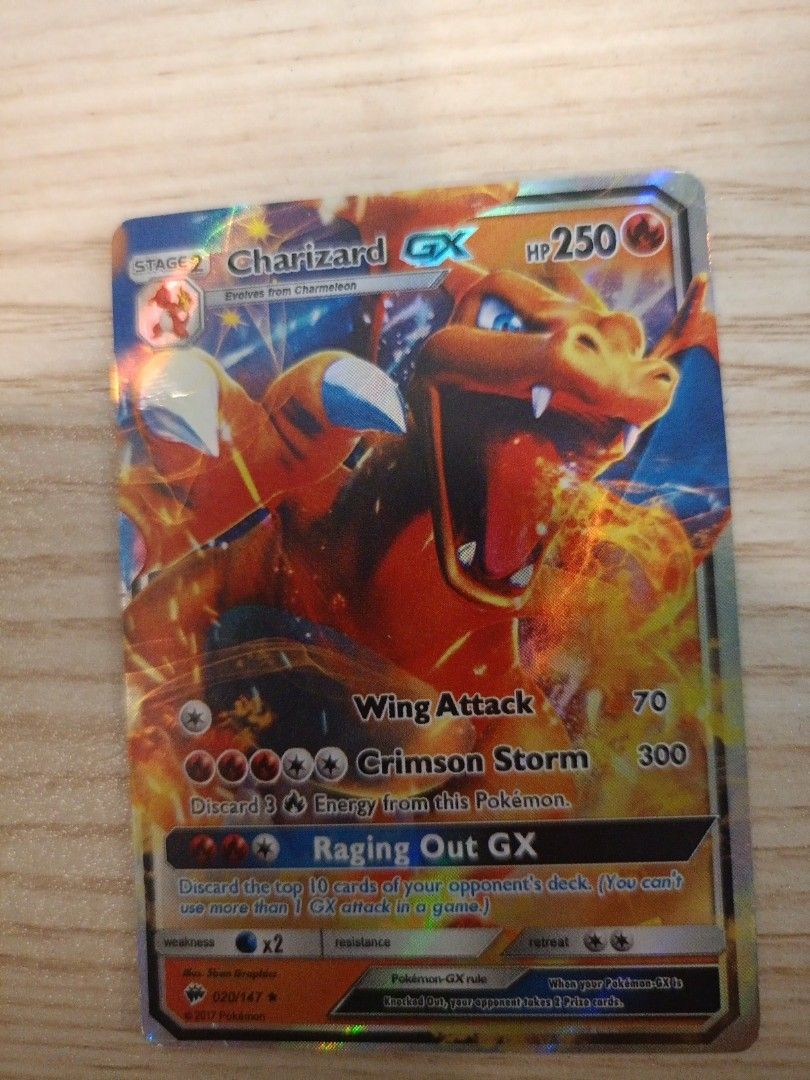 Charizard GX Pokemon Card (Category: Raw Singles) located in Manila. Submitted by cedric- (Listing ID 1396360138, Image 1). Description: - Charizard GX (20/147) Pokemon Card - Stage 2 - 250 HP - Attacks: Wing Attack, Crimson Storm, Raging Out GX - Holographic design.