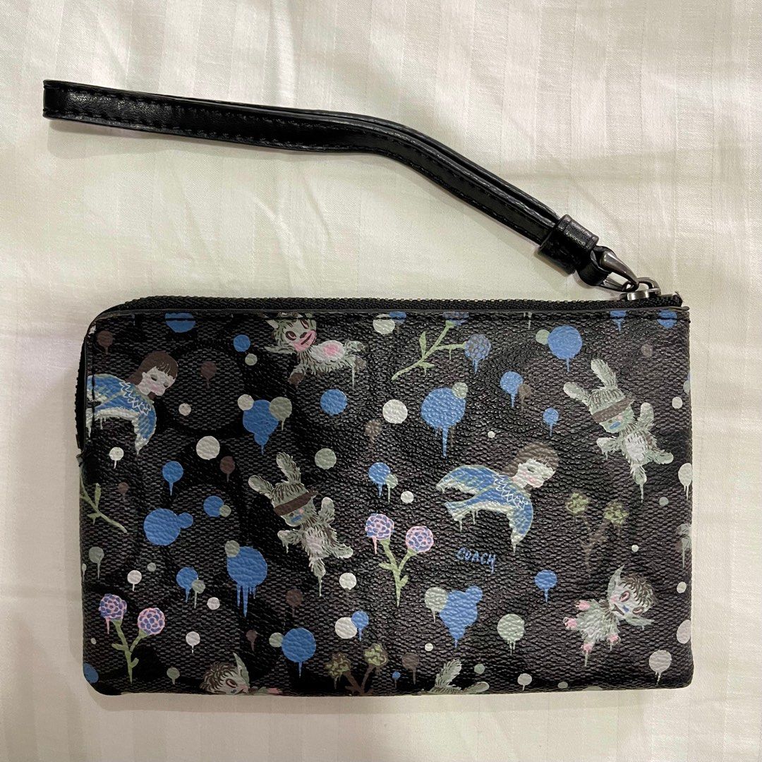 Coach Wristlet with Graphic Print (Category: Luxury Bags & Wallets) located in Quezon City. Submitted by scarlette310 (Listing ID 1396371749, Image 2). Description: - 7/10 Condition, some signs of wear & age - 100% original, I don’t sell fakes - Bought in Hawaii.