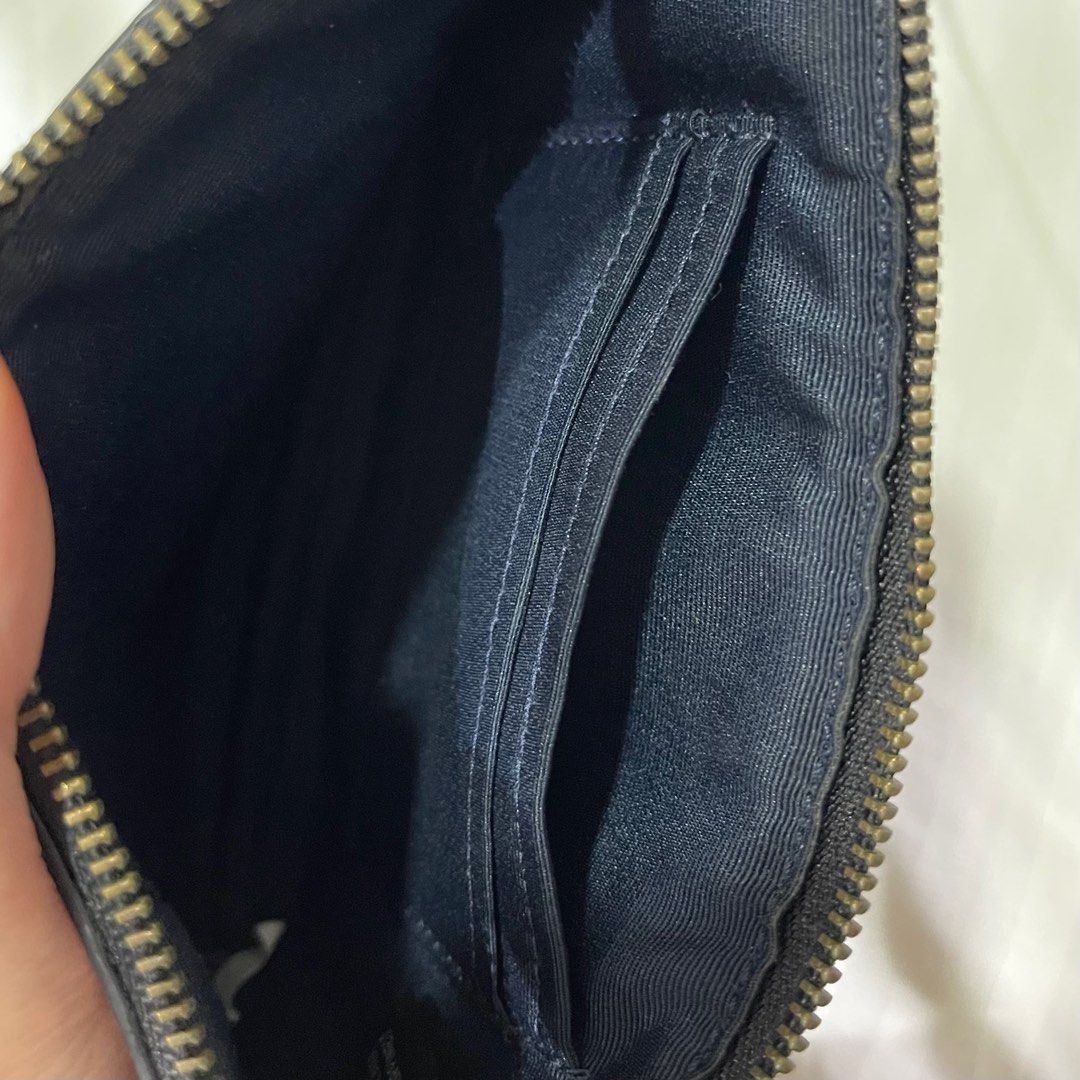 Coach Wristlet with Graphic Print (Category: Luxury Bags & Wallets) located in Quezon City. Submitted by scarlette310 (Listing ID 1396371749, Image 3). Description: - 7/10 Condition, some signs of wear & age - 100% original, I don’t sell fakes - Bought in Hawaii.