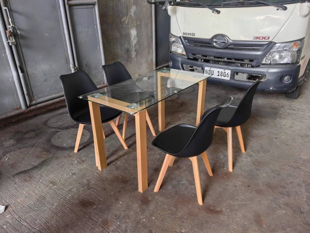 Dining glass table and padded chair (Category: Tables & Sets) located in Manila. Submitted by mry_rfl (Listing ID 1396466621, Image 1). Description: .