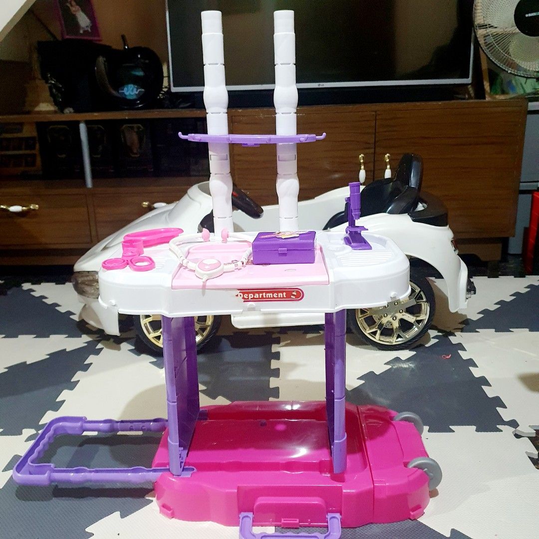 Doctor set convertible toys (Category: Kids Toys) located in Las Pinas. Submitted by cherry_luvs_dresses (Listing ID 1396448632, Image 2). Description: in good condition flaws: missing parts convetible to maleta bought for 1,500 at sm dept store high quality super discounted price.