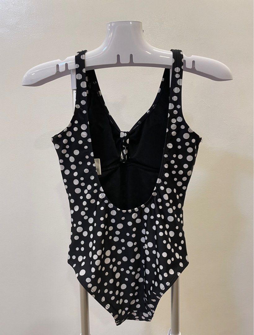 Energetics Swimsuit - Black and Pink (Category: Bikinis & Swimsuits) located in Caloocan City. Submitted by qbcloset (Listing ID 1396439998, Image 2). Description: Stylish Energetics swimsuit featuring a black base with a diagonal pink and white striped design. It has a racerback design with a pink accent. The back of the swimsuit has a keyhole design. The Energetics logo is visible on the back..