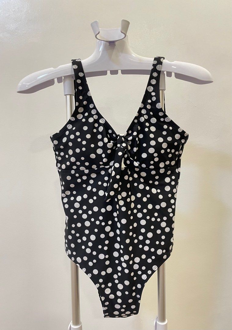 Energetics Swimsuit - Black and Pink (Category: Bikinis & Swimsuits) located in Caloocan City. Submitted by qbcloset (Listing ID 1396439998, Image 1). Description: Stylish Energetics swimsuit featuring a black base with a diagonal pink and white striped design. It has a racerback design with a pink accent. The back of the swimsuit has a keyhole design. The Energetics logo is visible on the back..