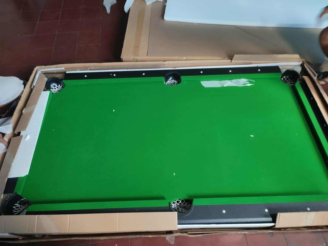 Foldable Billiard Table 3.5 x 6.5 ft (Category: Billiards and Bowling) located in Quezon City. Submitted by edxchii (Listing ID 1396352250, Image 2). Description: Re Stock! Brand New✅ - Foldable billiard table - Green felt surface - Size: 3.5 x 6.5 ft - Weight: 65kg - Includes: billiard balls, 2 cues, triangle rack, brush - Features pockets - Easy setup and fold-away storage Pm for inquiries..