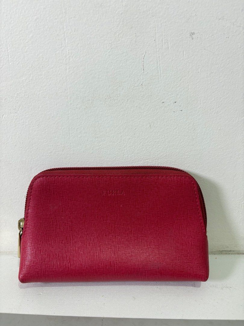 Furla Pouch (Category: Purses & Pouches) located in Quezon City. Submitted by geminiselection (Listing ID 1396470665, Image 1). Description: Authentic 💯 Liptint stain only yun issue.