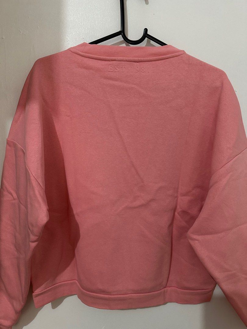 Guess Pink Sweatshirt - Size S (Category: Coats, Jackets and Outerwear) located in Antipolo. Submitted by decluttertosave (Listing ID 1396331102, Image 3). Description: - Pink Guess sweatshirt (Size S) - Features Guess logo on front - "EST. 1981" on back - Made in Bangladesh - Comfortable, casual style - Soft, fleece-like lining - Pink color.