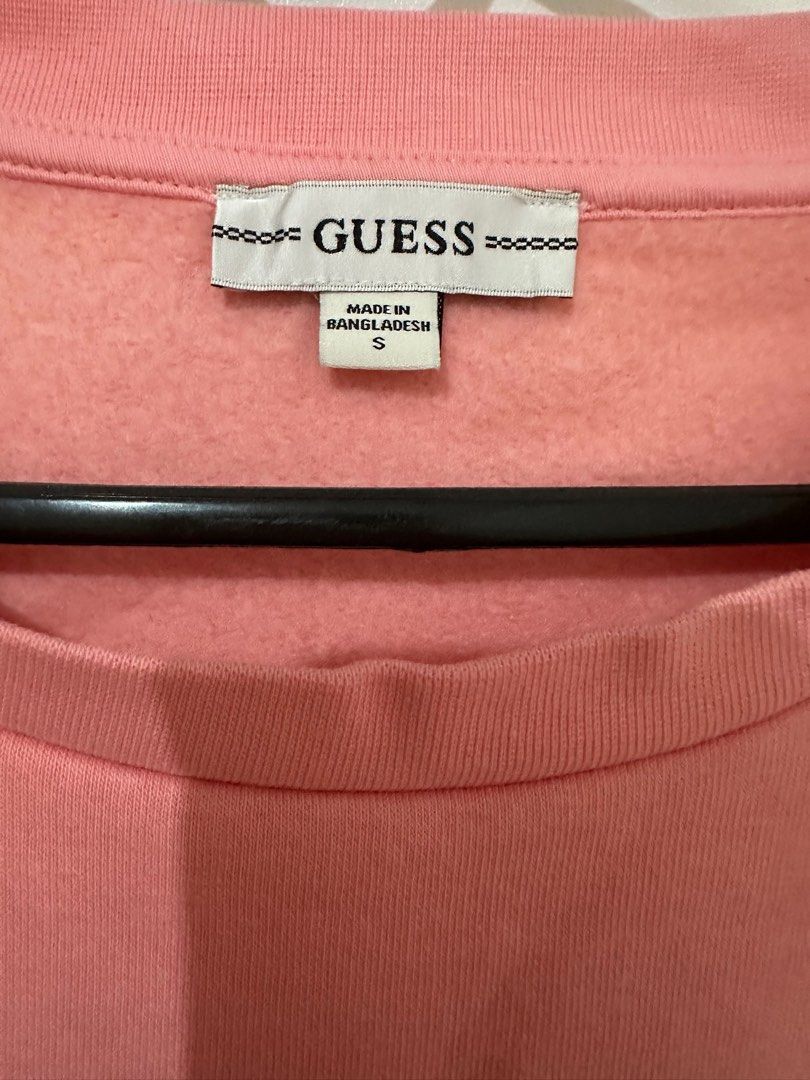 Guess Pink Sweatshirt - Size S (Category: Coats, Jackets and Outerwear) located in Antipolo. Submitted by decluttertosave (Listing ID 1396331102, Image 2). Description: - Pink Guess sweatshirt (Size S) - Features Guess logo on front - "EST. 1981" on back - Made in Bangladesh - Comfortable, casual style - Soft, fleece-like lining - Pink color.