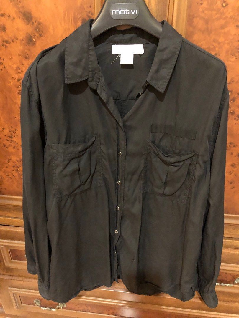 H&M L.O.G.G. Black Polo (Category: Longsleeves) located in Davao. Submitted by stylecircuit (Listing ID 1396413053, Image 2). Description: - H&M L.O.G.G. Black Shirt - Collared neckline - Button-down closure - Two front pockets - Long sleeves - Size: EUR 40, US 10, CA 10, CN 170/92A - Lightweight material.