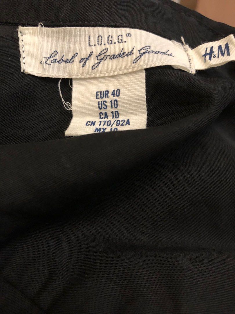 H&M L.O.G.G. Black Polo (Category: Longsleeves) located in Davao. Submitted by stylecircuit (Listing ID 1396413053, Image 1). Description: - H&M L.O.G.G. Black Shirt - Collared neckline - Button-down closure - Two front pockets - Long sleeves - Size: EUR 40, US 10, CA 10, CN 170/92A - Lightweight material.