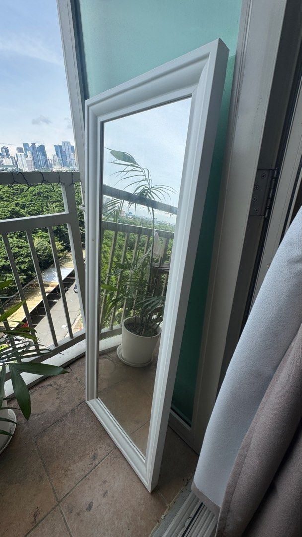 IKEA TOFTBYN White Mirror (Category: Mirrors) located in Pasig City. Submitted by angosays (Listing ID 1396299866, Image 1). Description: White framed mirror from IKEA. 52 x 140 cm Located in Pasig, pick-ups only.