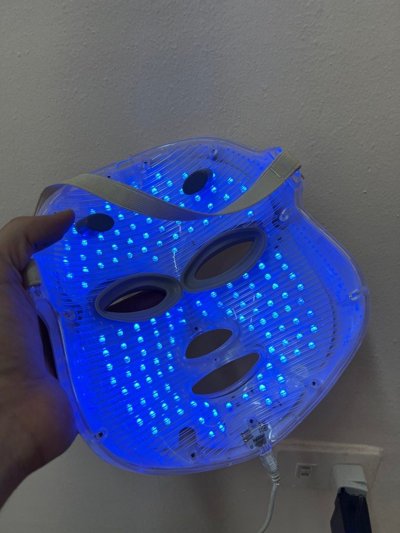 LED Face Mask with Multiple Light Settings (Category: Face Care) located in Taguig. Submitted by r_m_g (Listing ID 1396313765, Image 3). Description: - LED face mask for targeted skincare. - Features multiple light settings: green, red, and blue. - Comfortable and flexible design. - Adjustable strap for a perfect fit. - Plugs into a standard outlet. - In good working condition..