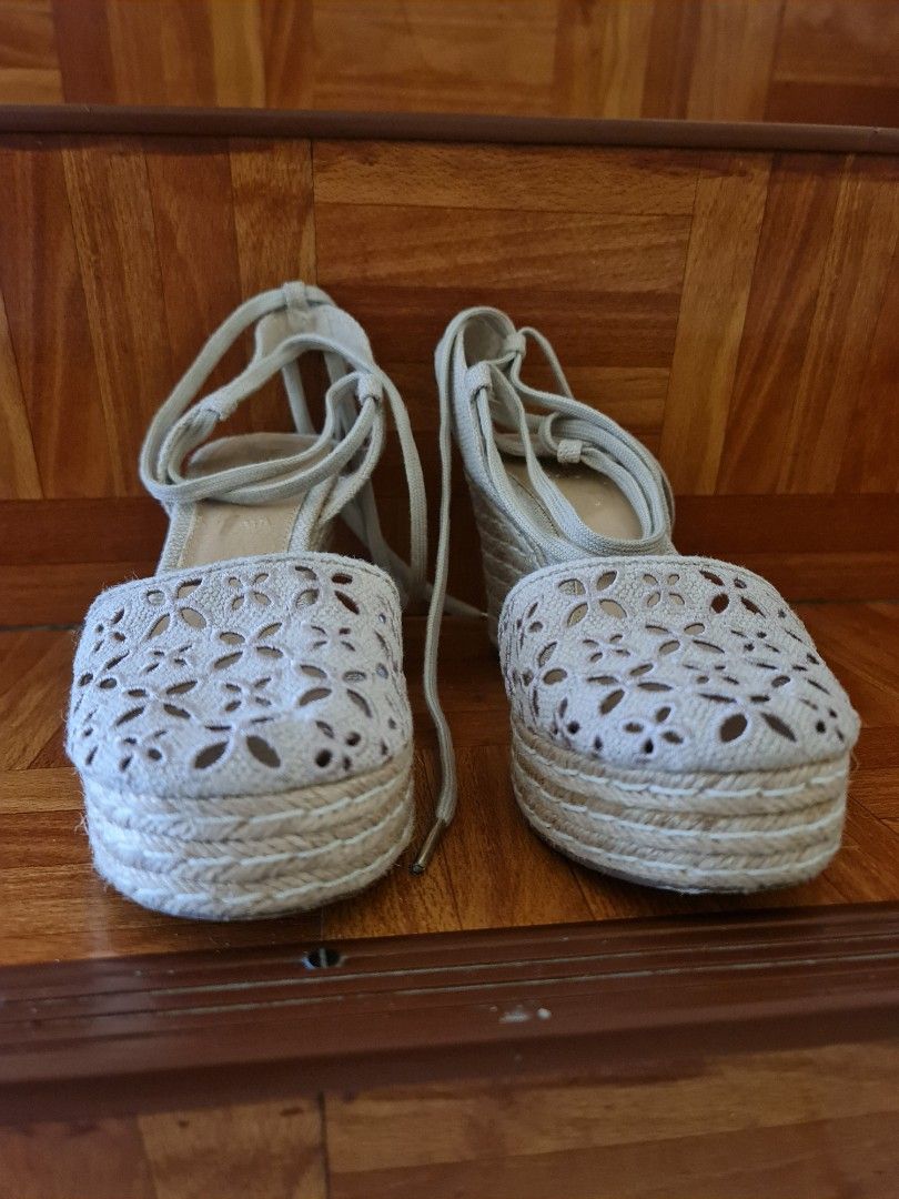 Michael Kors Darci Espadrille Wedges (Category: Wedges) located in Sibulan. Submitted by classy.potato (Listing ID 1396291152, Image 2). Description: - Michael Kors espadrille wedges - Beige color - Woven platform sole - Floral cut-out toe design - Lace-up closure - Ankle strap - MK logo detail.